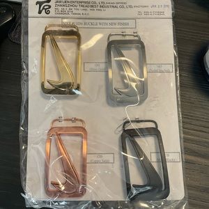 2010 Nike SAMPLE Card with 4 Belt Buckles - WOW